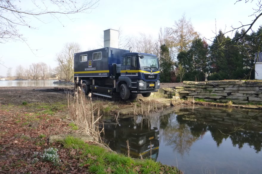 Van Dijk Geotechniek's Track-Truck conducts CPTs near water.