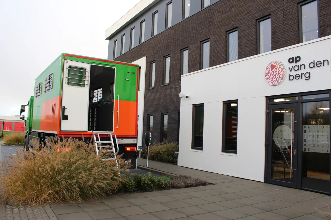 BAM Electric Track Truck in front of the A.P. van den Berg building